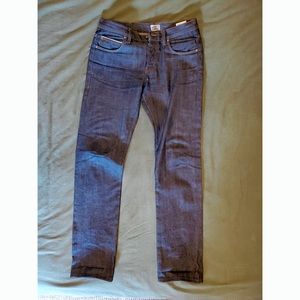 Naked & Famous “skinny guy” raw denim jeans.